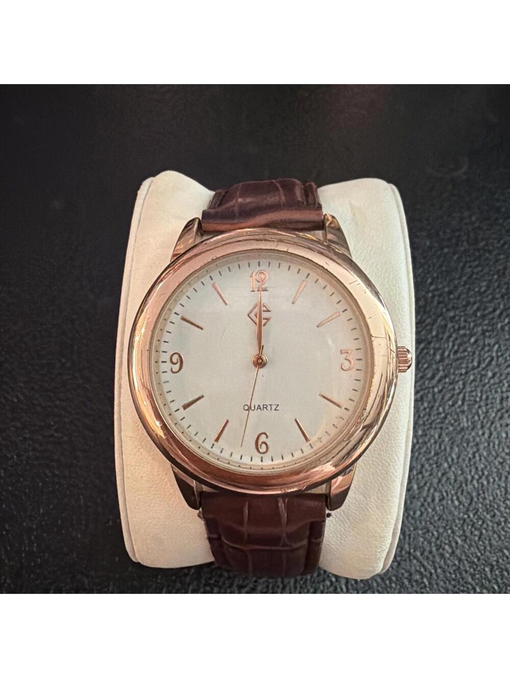 CG Women's Quartz Watch Brown Croc Embossed Band. The watch needs a battery